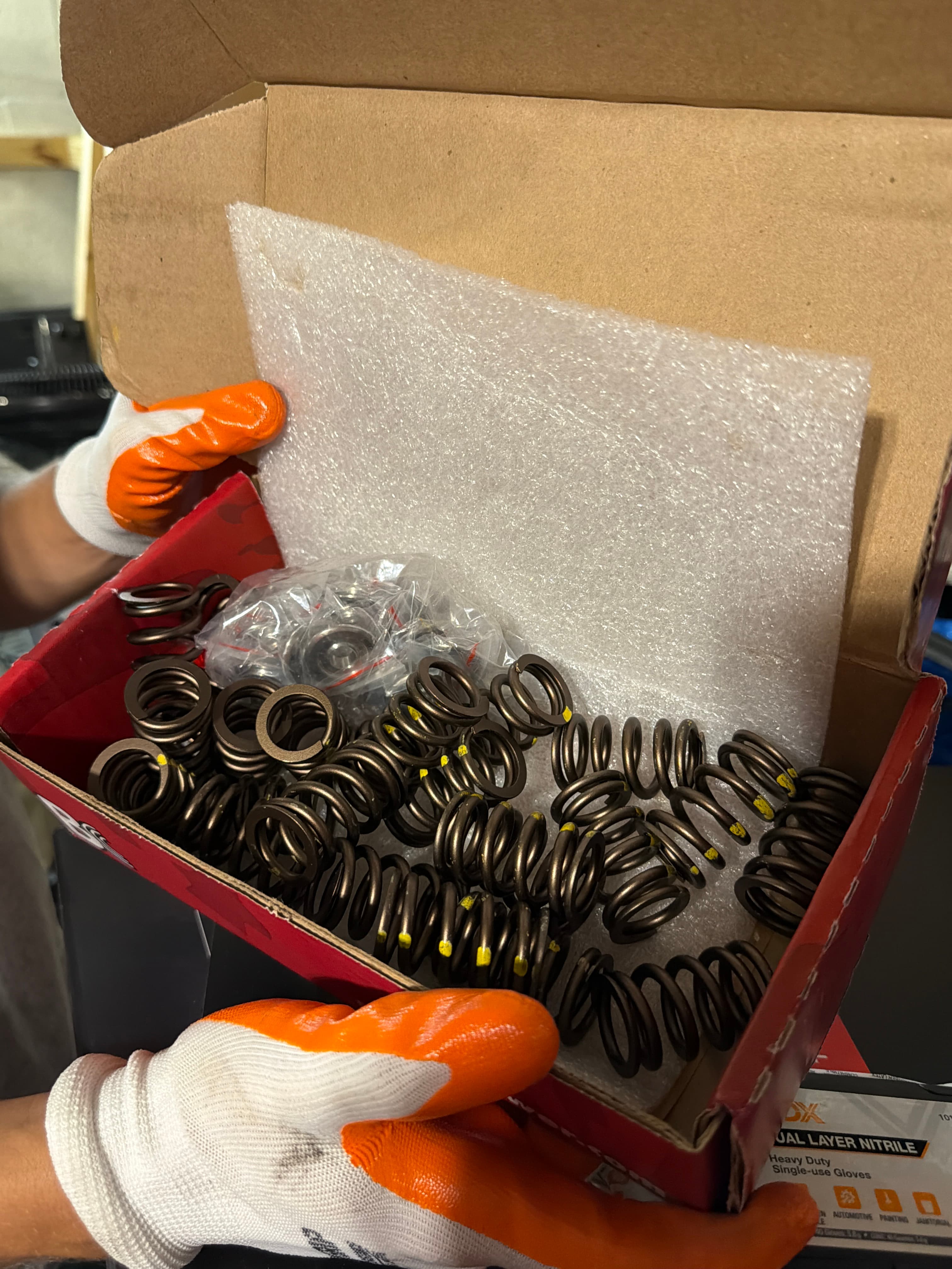 Valve spring & retainer kit — full set, new in box, dark/bronze finish w/ yellow ID dots — photo 1 of 1